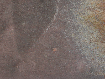 金属纹理背景，深灰色和棕色生锈的粗糙表面