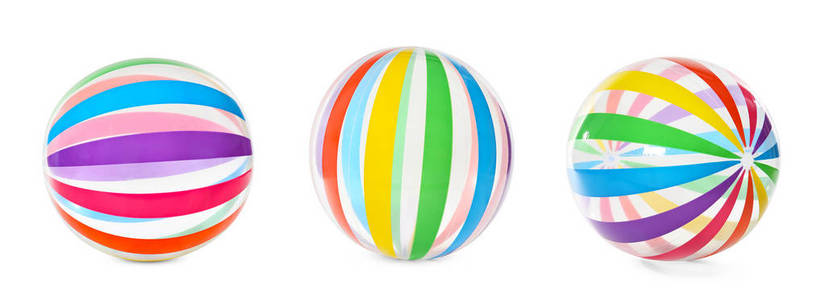白色背景上的一套明亮的充气球。 婴儿用品