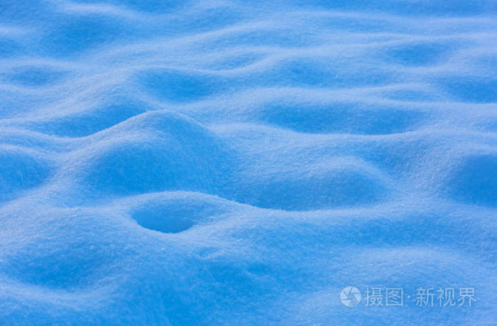 蓝色雪表面-抽象冬季背景