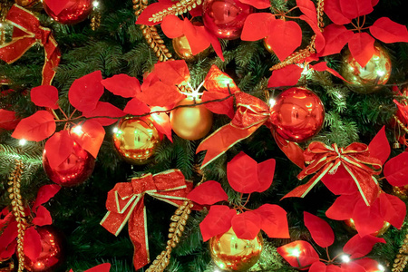  red colorful balls on Green Christmas tree background decoratio