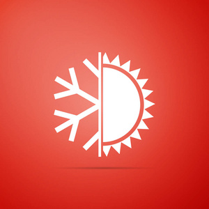 冷热符号。在红色背景上隔离的太阳和雪花图标。冬季和夏季的象征。扁平设计。矢量插图