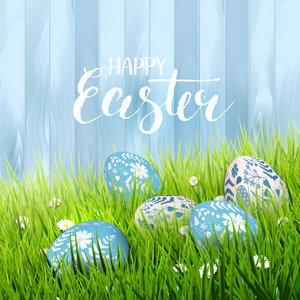 复活节快乐贺卡，鸡蛋躺在草地上。 刷字纹