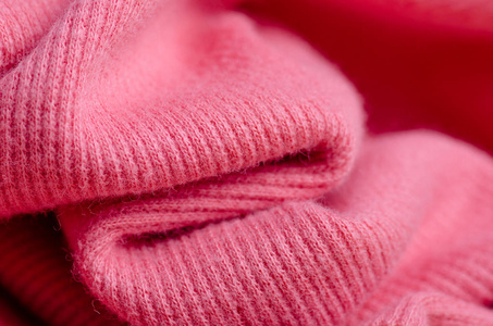面料暖粉丝毛衣纺织品质地模糊背景宏观
