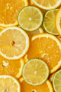 柑橘背景。 美丽的新鲜切片混合柑橘水果理念，健康饮食的顶级景观。