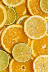 柑橘背景。 美丽的新鲜切片混合柑橘水果理念，健康饮食的顶级景观。