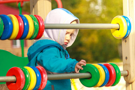 s climbing toy at school yard, back to school activity. kinderga