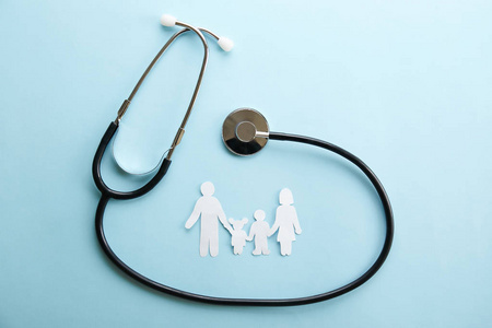  daughter. Stethoscope acoustic medical device on blue backgroun