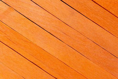 橙色对角线彩色木制背景。