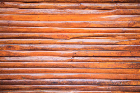 老化粗糙棕色纹理木材天然木栅栏，地板或墙板背景。室内装饰建筑住宅设计理念在建筑行业的应用