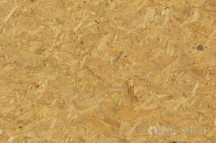 os b板是由棕色木屑砂成木制背景.