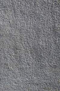 粗糙混凝土墙的纹理与浮雕纹理。 光滑的灰色表面