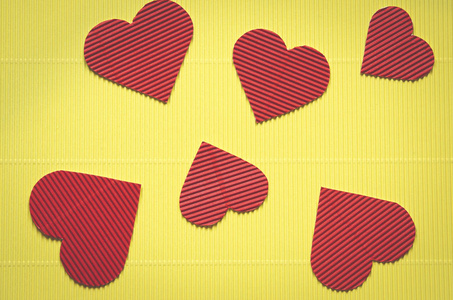 s Day. red hearts on yellow background