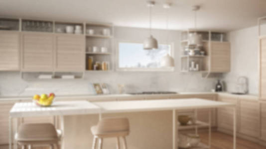 模糊背景室内设计白色厨房与木制细节和地板现代吊灯极简概念概念岛与凳子和配件。