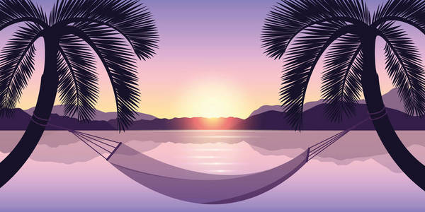 在海上日落时两棕榈树之间的吊床