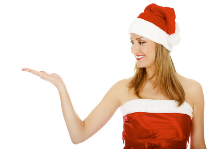 漂亮的女孩穿着红色的圣诞帽