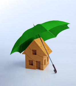 房子符号用一把雨伞家庭安全概念