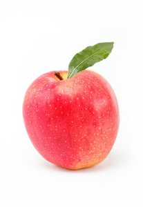 健康食品。新鲜红苹果与绿叶上白色 backgro