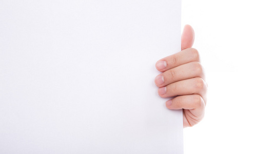 女人只手握住隔离在艾菲尔铁塔的白色背景上的白空纸