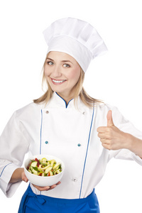 厨师举行健康的饮食习惯。工作室白色背景