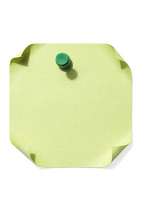 绿色空白便笺纸上的图钉