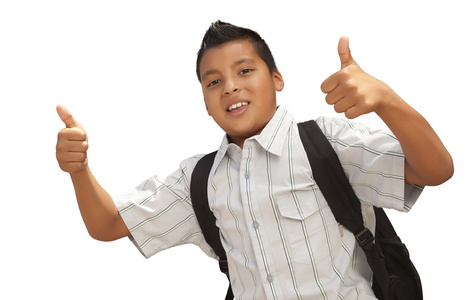 快乐年轻的西班牙裔美国人学校男孩与白色上竖起大拇指