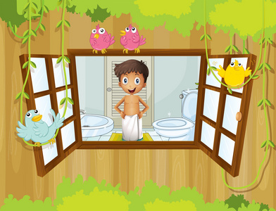 一个男孩用一条毛巾浴室内