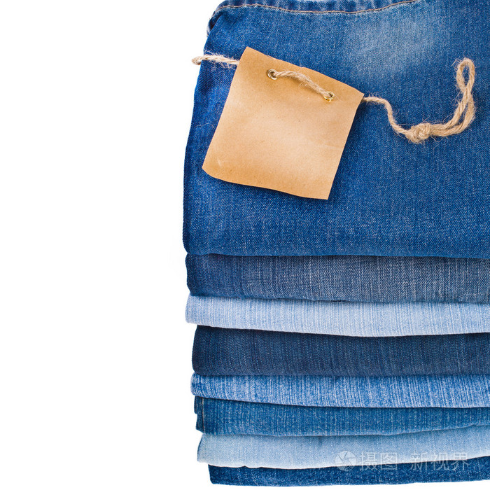 多的孤立在白色背景上的堆栈中的不同蓝色牛仔