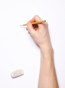 人的手与铅笔和橡皮擦在白色的图像