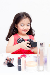 小亚洲儿童与化妆配件图片