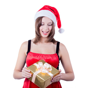 礼品盒与快乐圣诞老人 helper 女孩的照片