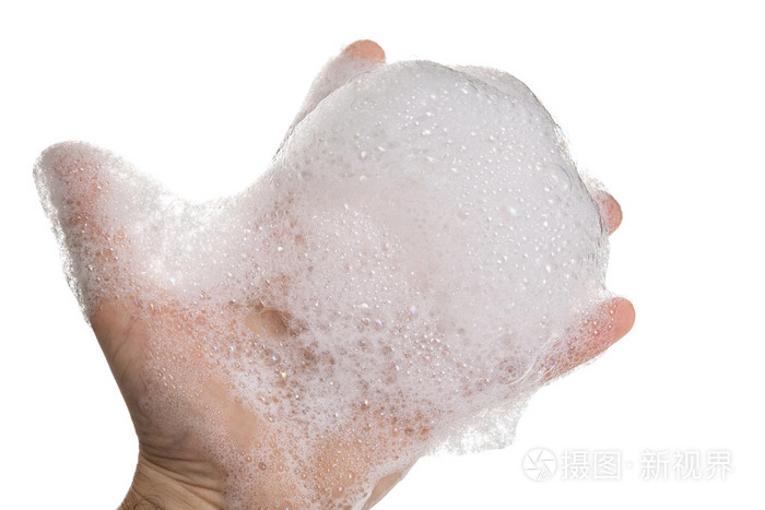 在人的手上的肥皂泡沫