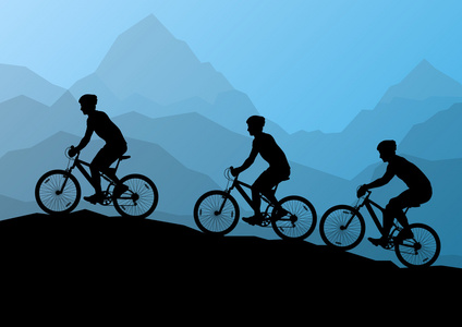 活跃的男性骑自行车自行车骑手在野生山自然土地