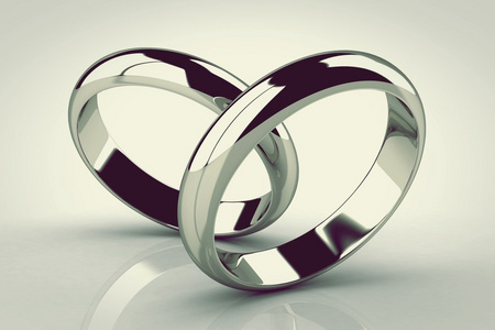 在白色背景上的结婚戒指