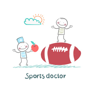 体育医生给苹果坐在一个巨大的足球球上的人