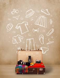 旅客行李与手绘制的衣服和图标