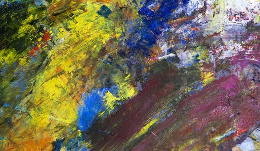 一位艺术家调色板上的油彩的抽象背景