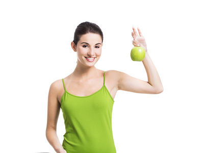 健康的女人与一个绿色的苹果