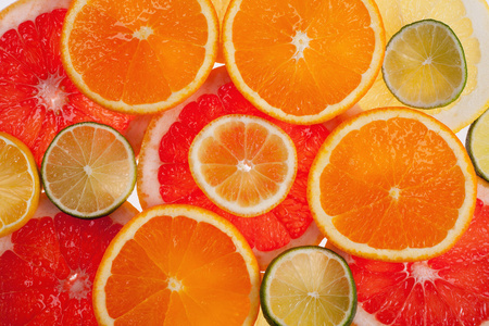 柑橘类水果不同彩色片背景关闭