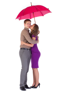 快乐有吸引力的几个男人和女人用的伞