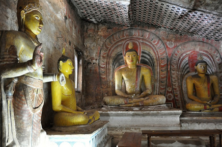 Buddha statues in Cave Temple in Dambulla Sr Lanka