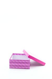 粉红色的礼物盒分离白色背景