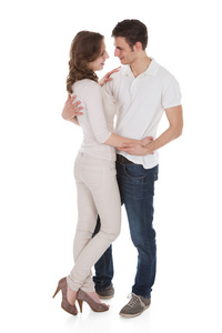 白之恋人帮工拥抱在白色的背景图片