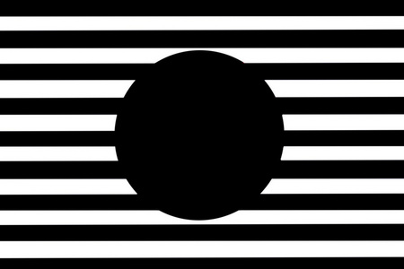 黑的圆圈在黑色和白色的格栅背景