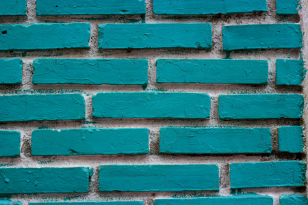 蓝色 grunge 砖墙，蓝白色背景上的砖砌墙体的质地