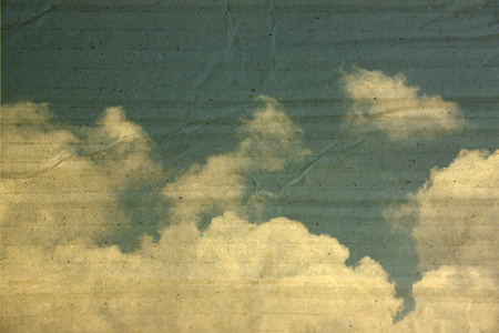 美纹纸框中的白云在蔚蓝的天空