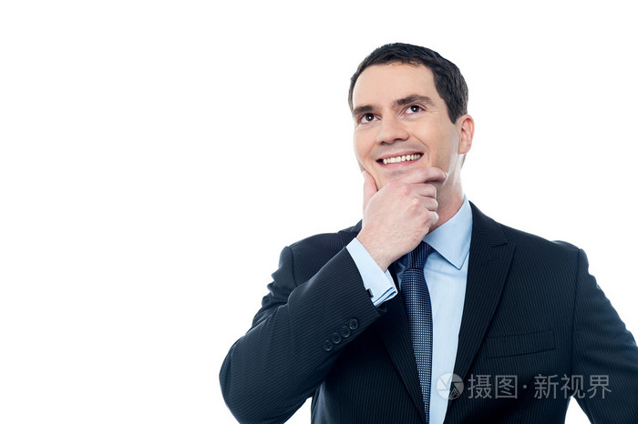 商人用手托住下巴思考