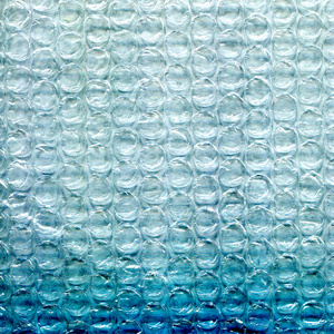 蓝色泡沫塑胶带纹理的背景图片