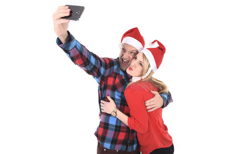 爱自拍照手机拍照在圣诞节的浪漫小两口