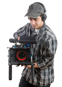 年轻的摄影师用专业相机
