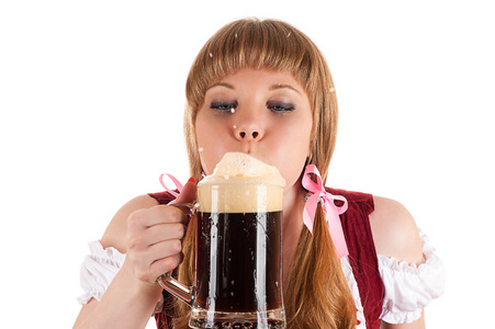 慕尼黑啤酒节服务员吹上白色孤立的啤酒泡沫